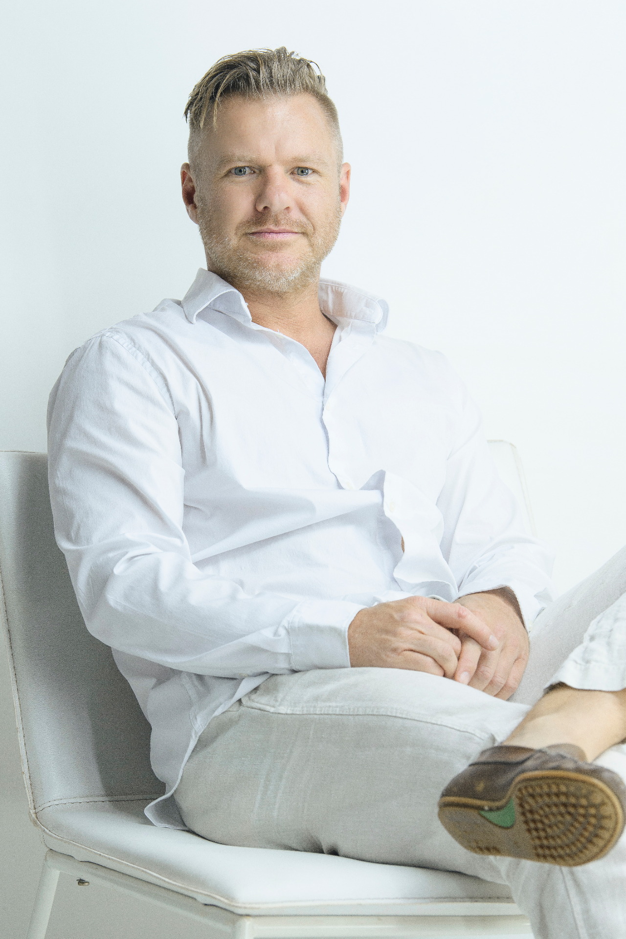 Marcus du Toit — Profile White Shirt Portrait