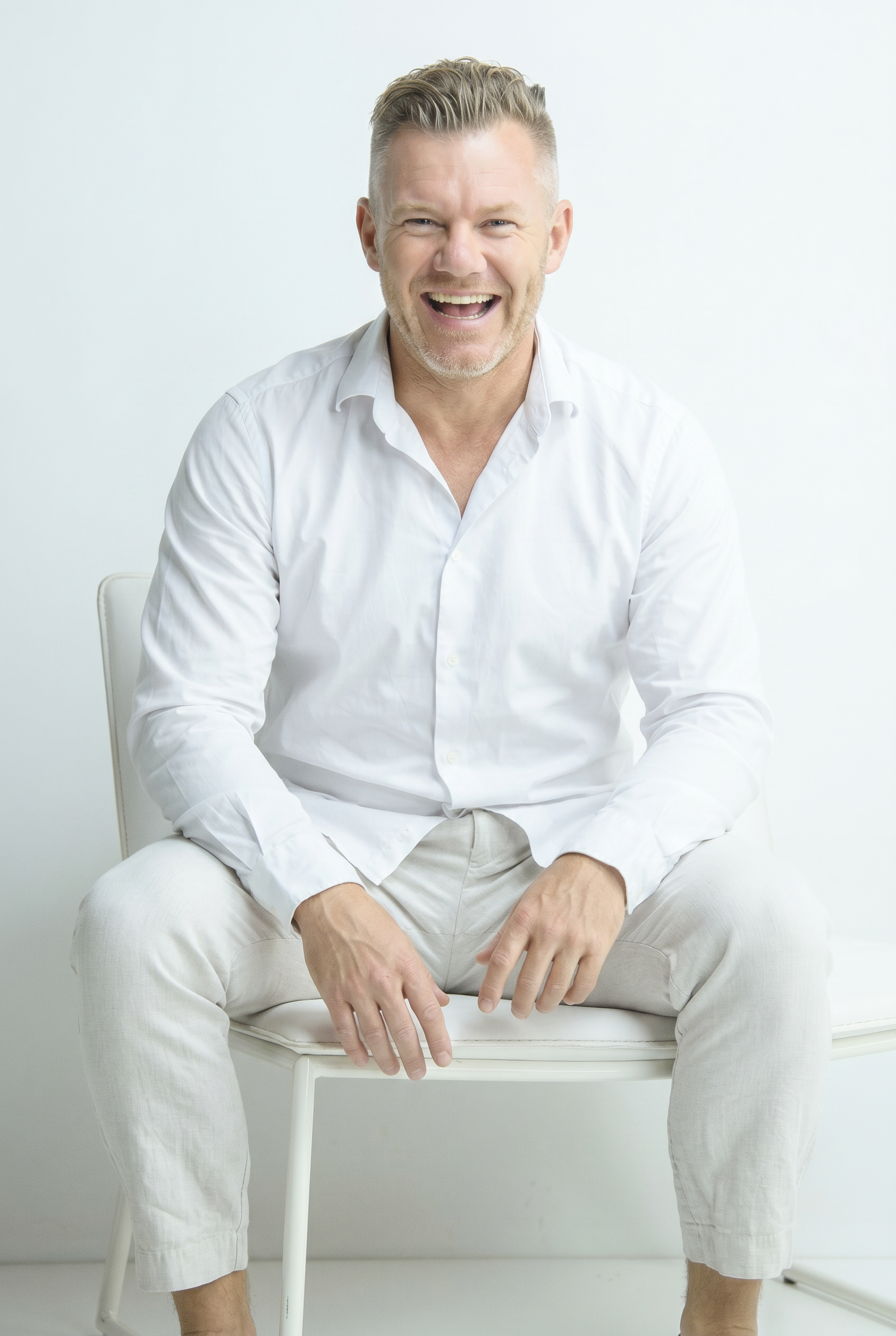 Marcus du Toit — Laughing White Shirt Portrait